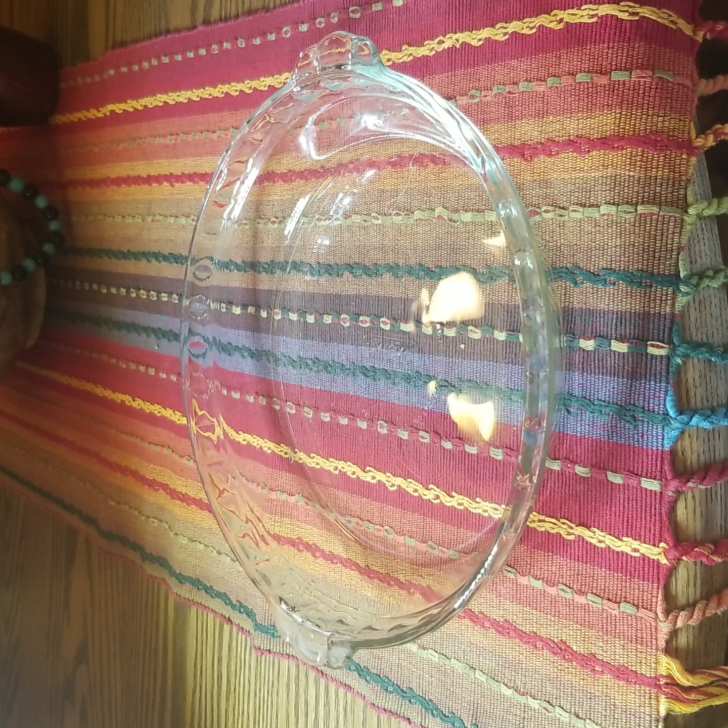 A clear Pyrex pie plate photographed for a US resale marketplace listing